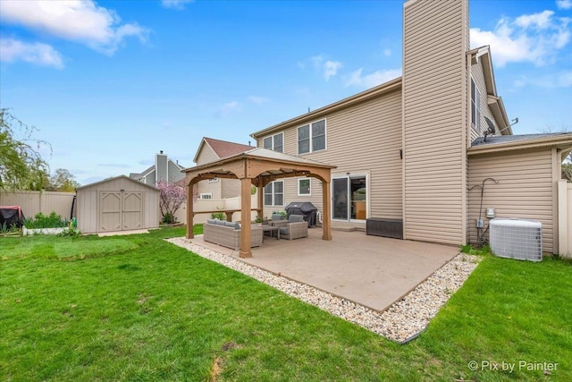 1682 Brompton Ln, Crystal Lake, IL 60014 - rear view of house with central AC unit, a gazebo, a storage unit, a patio, and outdoor lounge area