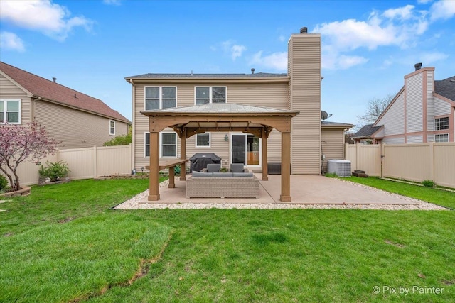 1682 Brompton Ln, Crystal Lake, IL 60014 - rear view of house featuring a gazebo, outdoor lounge area, a fenced backyard, and a patio area