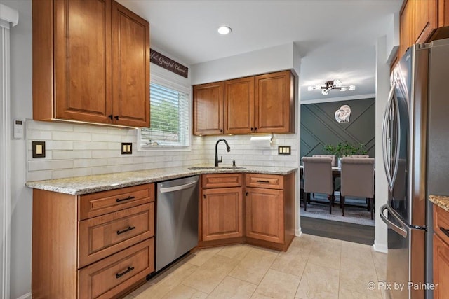 1682 Brompton Ln, Crystal Lake, IL 60014 - kitchen with brown cabinets, appliances with stainless steel finishes, and a sink