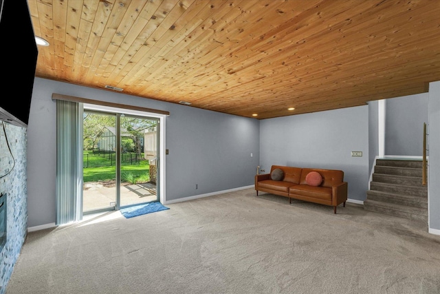unfurnished room featuring wooden ceiling, carpet floors, baseboards, stairs, and recessed lighting