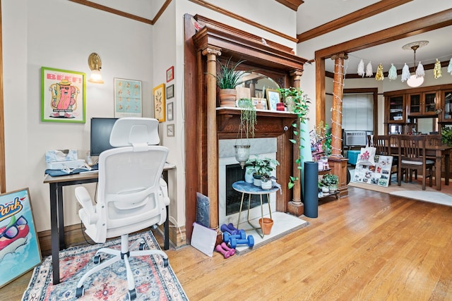 office with ornamental molding and wood finished floors