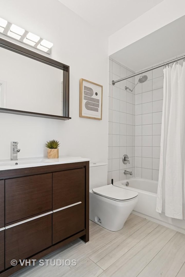 421 W Huron St Unit 1504, Chicago, IL 60654 - bathroom with vanity, shower / tub combo with curtain, and wood finished floors