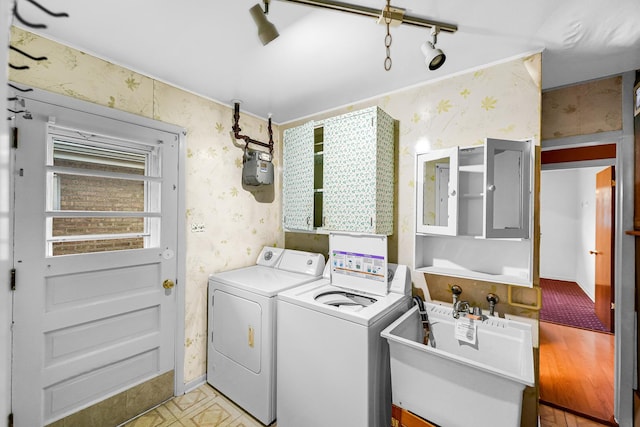 7616 S Lorel Ave, Burbank, IL 60459 - laundry area featuring wallpapered walls, laundry area, rail lighting, a sink, and independent washer and dryer
