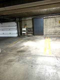 5201 Carriageway Dr Unit 315, Rolling Meadows, IL 60008 - shared laundry area with light tile patterned floors and washer and dryer