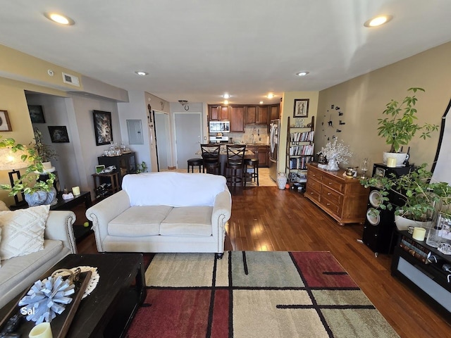 5201 Carriageway Dr Unit 315, Rolling Meadows, IL 60008 - living room with visible vents, recessed lighting, and dark wood-style floors