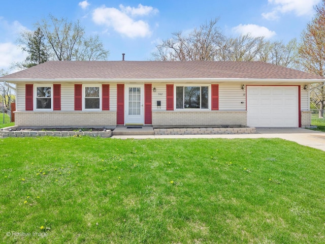 ranch-style house with brick siding, a front lawn, and driveway