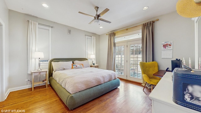 bedroom with recessed lighting, access to exterior, and light wood finished floors