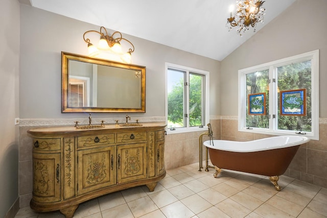 4240 Kingshill Cir, Naperville, IL 60564 - bathroom with tile walls, a chandelier, a soaking tub, tile patterned floors, and vanity