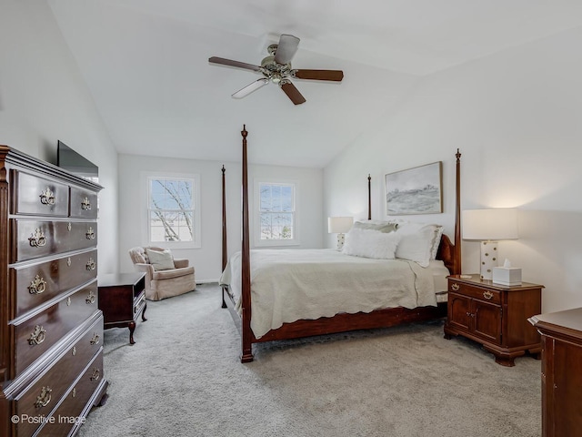 bedroom with ceiling fan, carpet, and lofted ceiling