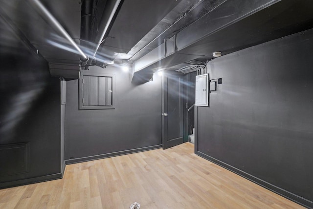 finished basement featuring wood finished floors