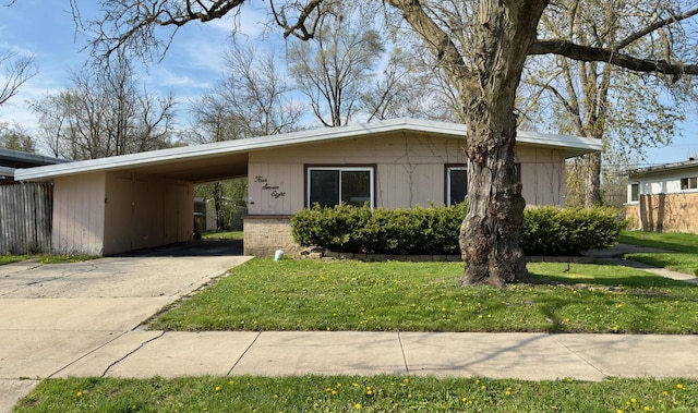 478 Talala St, Park Forest, IL 60466 - view of front of house with a front lawn, driveway, a carport, and brick siding