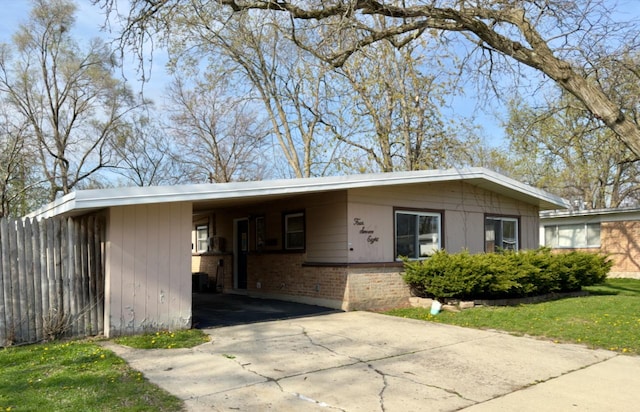 478 Talala St, Park Forest, IL 60466 - view of front of property with brick siding, driveway, and an attached carport