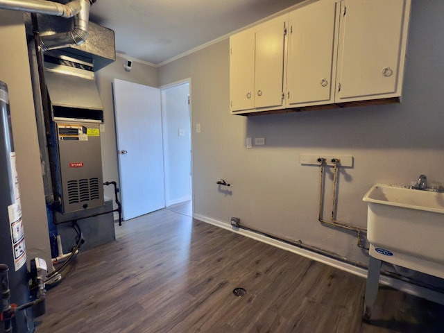 478 Talala St, Park Forest, IL 60466 - laundry area featuring cabinet space, dark wood finished floors, crown molding, hookup for a washing machine, and baseboards