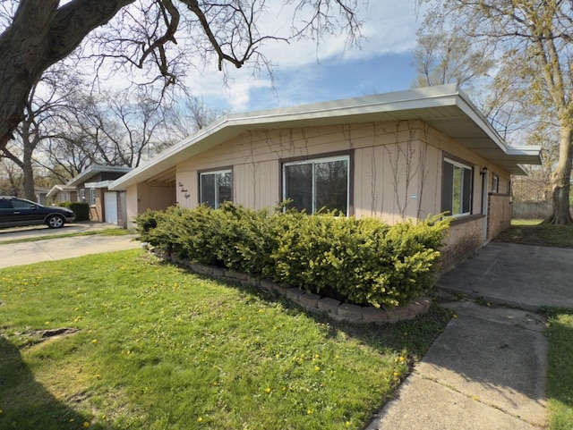 478 Talala St, Park Forest, IL 60466 - view of home's exterior featuring a garage and a yard
