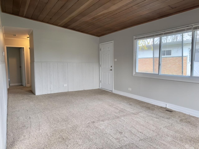 478 Talala St, Park Forest, IL 60466 - carpeted spare room with wooden ceiling and a wainscoted wall