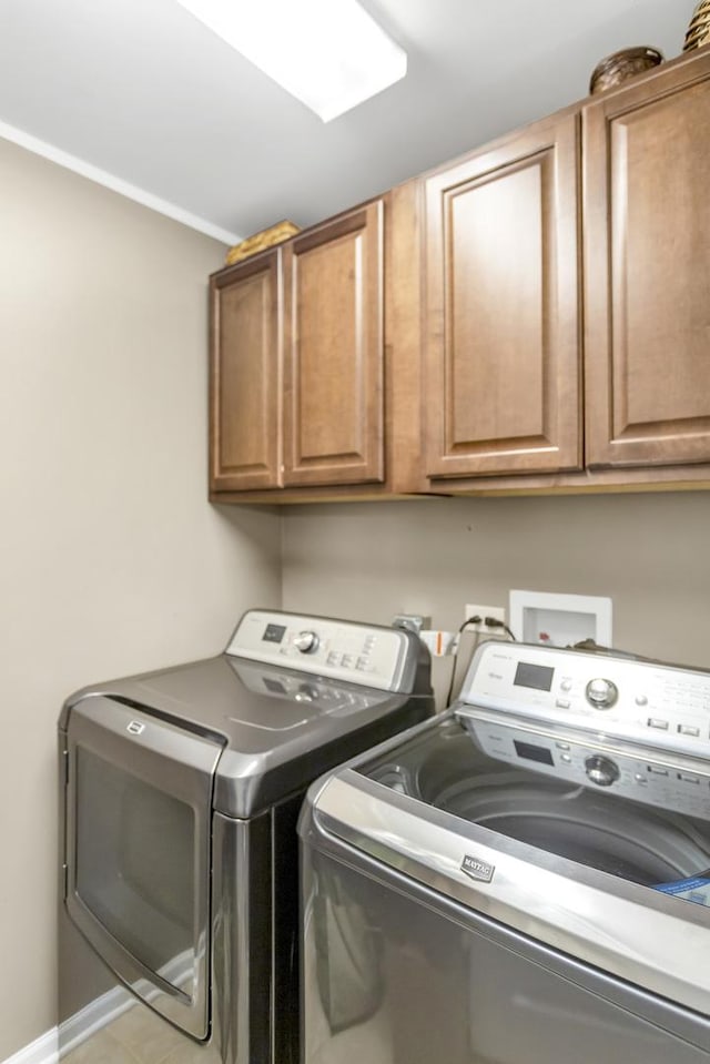 1122 Chelsea Dr, Lake Zurich, IL 60047 - clothes washing area featuring cabinet space and washing machine and clothes dryer