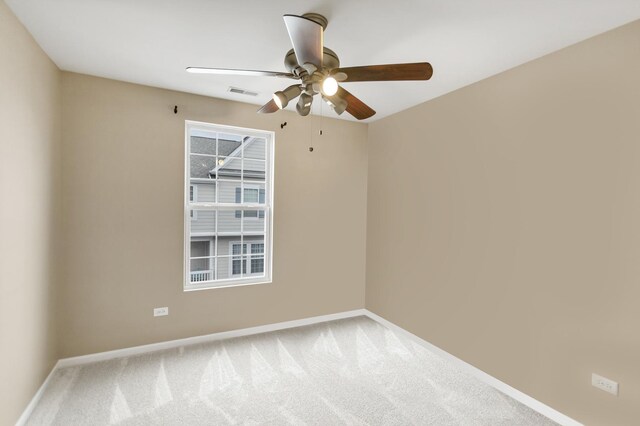 1122 Chelsea Dr, Lake Zurich, IL 60047 - carpeted spare room featuring baseboards, a ceiling fan, and visible vents