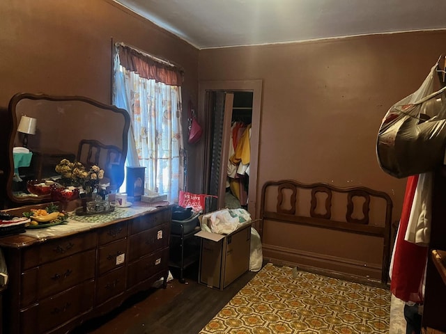 117 W 103rd Pl, Chicago, IL 60628 - bedroom with dark wood-type flooring