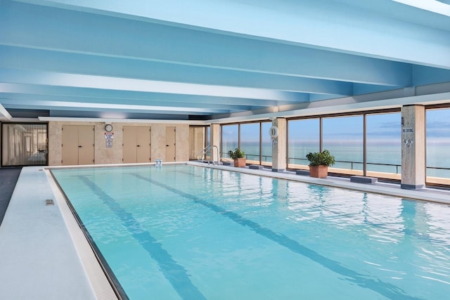 community pool with a water view