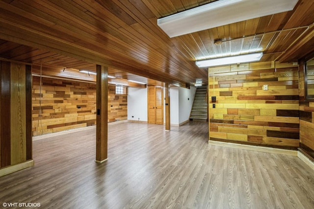 3809 N Sayre Ave, Chicago, IL 60634 - finished below grade area with stairs, wood finished floors, baseboards, wooden walls, and wood ceiling