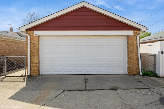 3809 N Sayre Ave, Chicago, IL 60634 - detached garage featuring fence and a gate