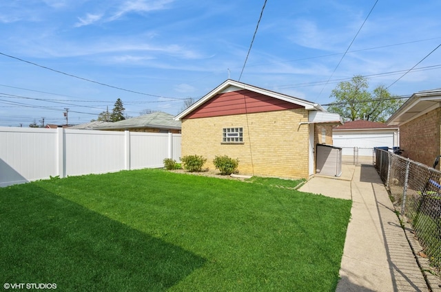 3809 N Sayre Ave, Chicago, IL 60634 - view of yard with a fenced backyard