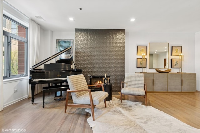 33 W Huron St Unit 309, Chicago, IL 60654 - living area with plenty of natural light, wood finished floors, baseboards, and recessed lighting