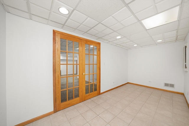 spare room with baseboards, visible vents, french doors, and recessed lighting