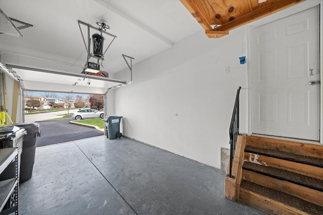 garage featuring a garage door opener