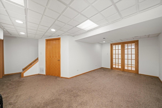 finished below grade area with visible vents, recessed lighting, carpet flooring, and baseboards