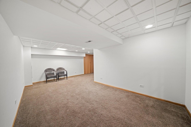 finished below grade area with recessed lighting, visible vents, carpet, and baseboards
