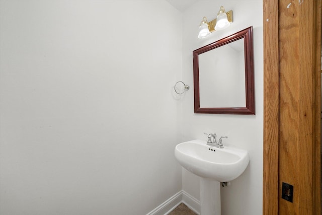 bathroom featuring baseboards
