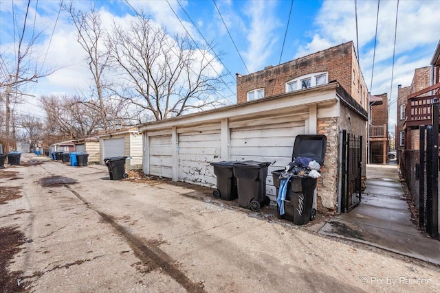 detached garage with fence