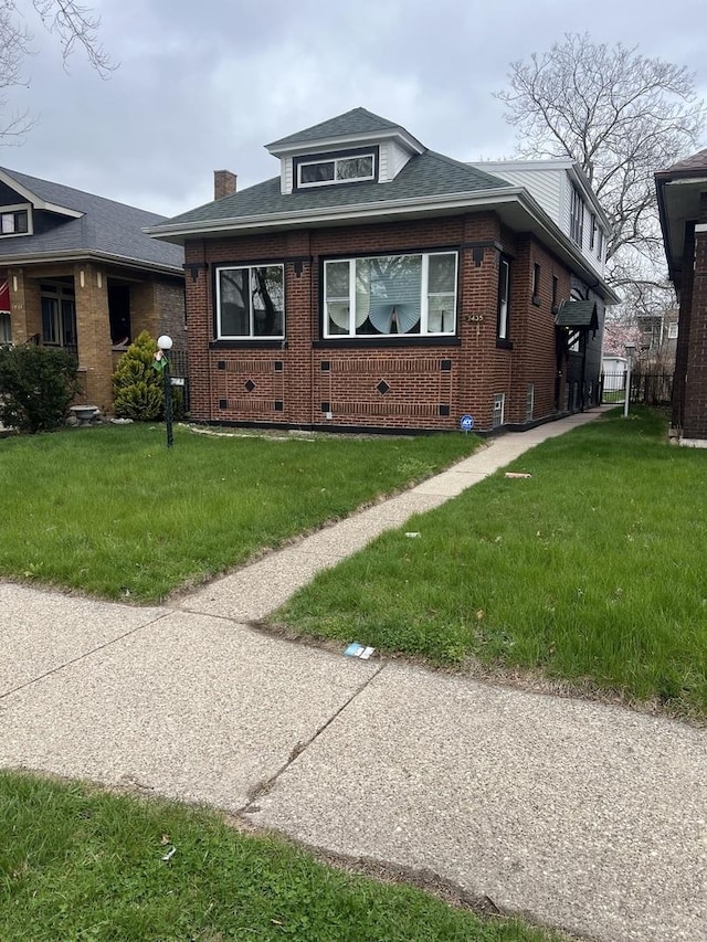 7435 S Indiana Ave, Chicago, IL 60619 - view of front of home featuring brick siding