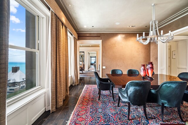 159 E Walton Pl Unit 34A, Chicago, IL 60611 - dining area featuring an inviting chandelier, ornamental molding, dark wood-type flooring, and recessed lighting