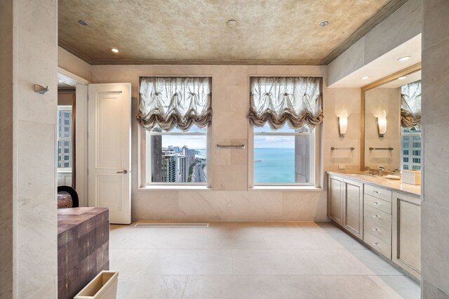 159 E Walton Pl Unit 34A, Chicago, IL 60611 - bathroom with tile patterned flooring, vanity, and ornamental molding