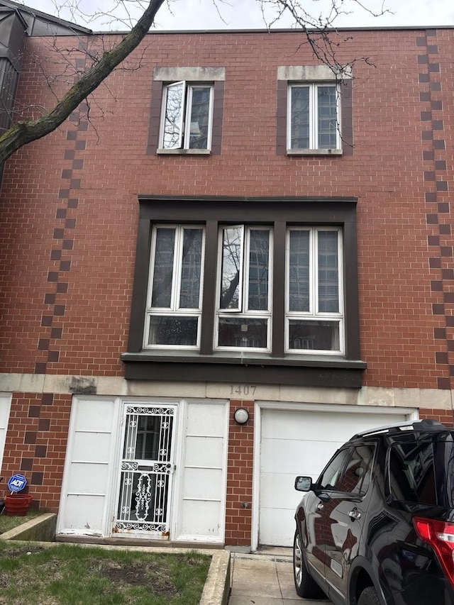 exterior space featuring brick siding