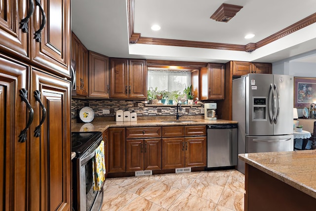 11138 Center Rd Unit E22, Palos Hills, IL 60465 - kitchen featuring appliances with stainless steel finishes, backsplash, crown molding, a raised ceiling, and light marble finish flooring
