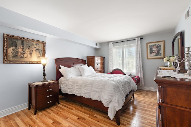 11138 Center Rd Unit E22, Palos Hills, IL 60465 - bedroom with light wood-style floors and baseboards