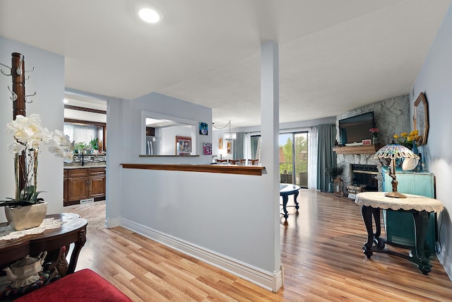 11138 Center Rd Unit E22, Palos Hills, IL 60465 - living room with light wood finished floors and a fireplace