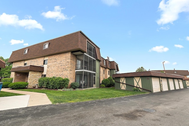 11138 Center Rd Unit E22, Palos Hills, IL 60465 - view of building exterior featuring community garages