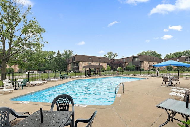 11138 Center Rd Unit E22, Palos Hills, IL 60465 - community pool featuring a patio area