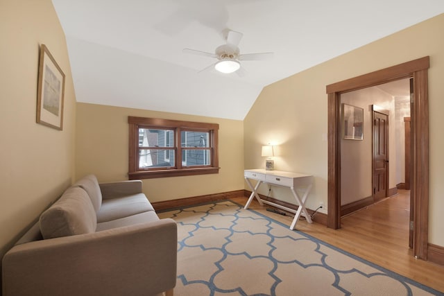 1726 Wesley Ave, Evanston, IL 60201 - living area with lofted ceiling, baseboards, wood finished floors, and ceiling fan