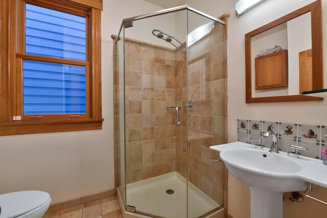 1726 Wesley Ave, Evanston, IL 60201 - full bathroom with toilet, a sink, and a stall shower