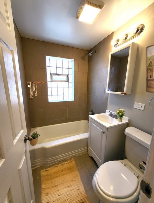 5133 W 64th St, Chicago, IL 60638 - full bath with shower / bathing tub combination, tile patterned floors, vanity, and toilet