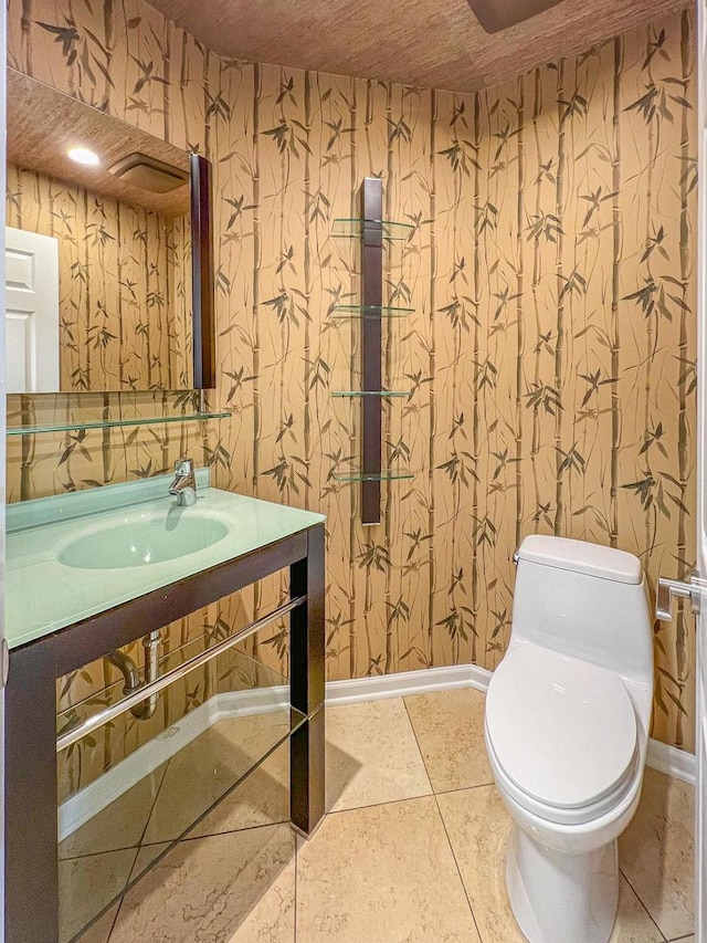 2073 Cambria Ct, Northbrook, IL 60062 - bathroom with wallpapered walls, vanity, toilet, and baseboards