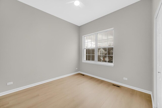 2073 Cambria Ct, Northbrook, IL 60062 - empty room featuring light wood-type flooring, visible vents, a ceiling fan, and baseboards