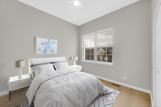 2073 Cambria Ct, Northbrook, IL 60062 - bedroom featuring baseboards, a ceiling fan, wood finished floors, and visible vents