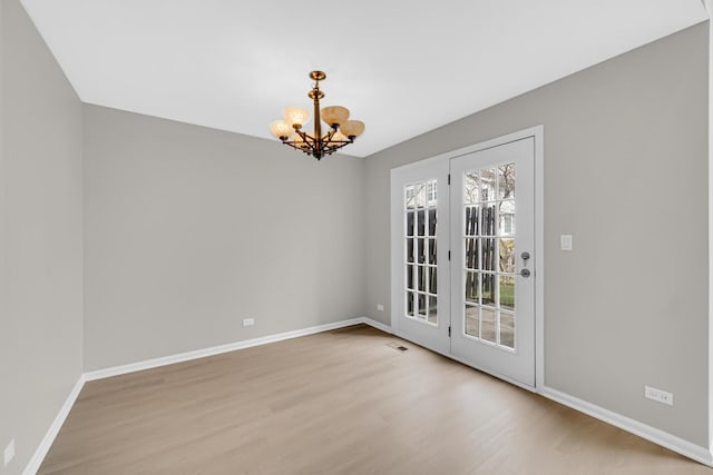 2073 Cambria Ct, Northbrook, IL 60062 - interior space with a chandelier, light wood-style floors, and baseboards