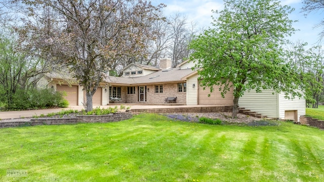 7S745 State Route 53rd Hwy, Naperville, IL 60540 - back of house featuring a chimney, a lawn, and a garage